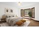 Cozy bedroom with a bay window, neutral tones, and stylish decor at 616 Cross Timbers Dr, Durham, NC 27713