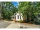 Charming home exterior featuring a bay window and mature landscaping at 616 Cross Timbers Dr, Durham, NC 27713