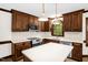 Beautiful kitchen with wooden cabinets, quartz countertops, and stainless steel appliances at 616 Cross Timbers Dr, Durham, NC 27713