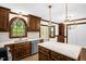Stylish kitchen featuring a large island, stainless steel appliances, and ample counter space at 616 Cross Timbers Dr, Durham, NC 27713