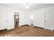 Spacious living room with natural light, showcasing neutral paint and hardwood floors at 616 Cross Timbers Dr, Durham, NC 27713