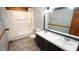 Bathroom with gray walls, a double vanity, and a shower/tub combination at 6600 Sadie Dr, Wendell, NC 27591