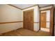 Bedroom featuring a closet with wood-framed doors at 6600 Sadie Dr, Wendell, NC 27591