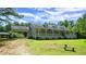 Southern home with a covered porch and carport in a lush green yard at 6600 Sadie Dr, Wendell, NC 27591