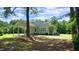 Lovely single-story home with attached covered parking and landscaped front yard at 6600 Sadie Dr, Wendell, NC 27591