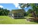 Exterior of house showing side view of attached carport and well-manicured lawn at 6600 Sadie Dr, Wendell, NC 27591