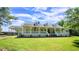 Charming two-story home with covered porch and well-manicured lawn at 6600 Sadie Dr, Wendell, NC 27591