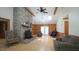 Spacious living room with stone fireplace, hardwood floors, and comfortable seating at 6600 Sadie Dr, Wendell, NC 27591