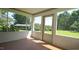 Enjoy views from this lovely screened porch with tile flooring at 6600 Sadie Dr, Wendell, NC 27591
