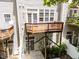 Second-story deck overlooks backyard patio and basement door at 6809 Middleboro Dr Dr, Raleigh, NC 27612
