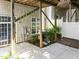 Backyard patio with second-story deck and door to basement at 6809 Middleboro Dr Dr, Raleigh, NC 27612