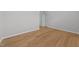 This bedroom features hardwood floors, neutral colors and ample natural light at 6809 Middleboro Dr Dr, Raleigh, NC 27612