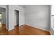 Bedroom featuring hardwood floors and closet at 6809 Middleboro Dr Dr, Raleigh, NC 27612