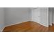 Bedroom featuring hardwood floors and closet at 6809 Middleboro Dr Dr, Raleigh, NC 27612