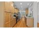 Kitchen with granite countertops, stainless steel appliances, and hardwood floors at 6809 Middleboro Dr Dr, Raleigh, NC 27612