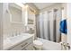 Bathroom with a single sink vanity, toilet, shower and bath at 82 Finley Ct, Clayton, NC 27520
