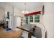 Traditional dining room with built-in bench seating, wood table and a view of the yard at 82 Finley Ct, Clayton, NC 27520