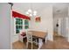 Traditional dining room with built-in bench seating, wood table and a view of the yard at 82 Finley Ct, Clayton, NC 27520