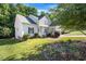 Well-maintained home with lush landscaping and a welcoming front entrance at 82 Finley Ct, Clayton, NC 27520