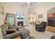 Inviting living room with a fireplace, neutral decor, and ample natural light at 82 Finley Ct, Clayton, NC 27520