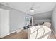 Cozy living room featuring comfortable seating, television, and lots of natural light at 82 Finley Ct, Clayton, NC 27520