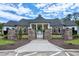 Beautiful clubhouse with stone accents and manicured landscaping provides a community gathering space for residents at 9048 Chelsea Dr, Raleigh, NC 27603
