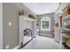 Walk-in closet with custom shelving and mirror providing ample storage and organization at 9048 Chelsea Dr, Raleigh, NC 27603