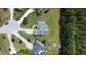 Overhead view of the property showcasing its placement within the neighborhood and surrounding greenery at 100 S Sunset Ridge Dr, Willow Springs, NC 27592