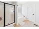 Bathroom featuring a glass shower, soaking tub, and tile flooring at 100 S Sunset Ridge Dr, Willow Springs, NC 27592