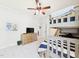 Bedroom with a bunk bed and wooden dresser in a well-lit room at 100 S Sunset Ridge Dr, Willow Springs, NC 27592