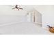 Spacious bedroom with a ceiling fan and ample natural light at 100 S Sunset Ridge Dr, Willow Springs, NC 27592