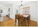 Cozy dining area featuring a wood table and chairs, with a fireplace visible in the background at 100 S Sunset Ridge Dr, Willow Springs, NC 27592