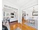 Open-concept living spaces showcasing the seamless flow between the living room and dining area at 100 S Sunset Ridge Dr, Willow Springs, NC 27592