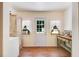 Cozy mud room featuring hardwood floors, charming décor, and functional storage for a convenient entry space at 10031 Old Middlesex Rd, Middlesex, NC 27557