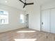 Bright bedroom features hardwood floors, closet, and ample natural light at 1009 Parker St, Raleigh, NC 27607