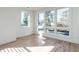 Bright bedroom with hardwood floors, large windows, and natural light at 1009 Parker St, Raleigh, NC 27607