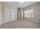 Inviting bedroom featuring closet storage and natural light from a window at 1012 Palace Garden Way, Raleigh, NC 27603