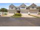 Townhome garages with driveway, landscaping, and a convenient layout at 1012 Palace Garden Way, Raleigh, NC 27603