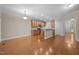Open floor plan featuring a kitchen with an island and an adjacent dining area at 1012 Palace Garden Way, Raleigh, NC 27603