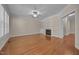 Cozy living room with a fireplace and abundant natural light, perfect for relaxation and gatherings at 1012 Palace Garden Way, Raleigh, NC 27603