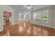 Bright and airy living room with large windows, offering a welcoming space for relaxation and entertainment at 1012 Palace Garden Way, Raleigh, NC 27603