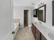 Relaxing bathroom with soaking tub, double vanity, and stylish tile flooring at 1092 Adams Point Dr, Garner, NC 27529