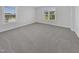 Inviting bedroom with plush carpeting and sun-filled windows at 1092 Adams Point Dr, Garner, NC 27529