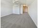 Cozy bedroom with plush carpeting, ceiling fan, and bright natural light at 1092 Adams Point Dr, Garner, NC 27529