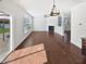 Spacious living room with hardwood floors, a fireplace, and a ceiling fan at 1092 Adams Point Dr, Garner, NC 27529