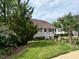 Beautiful lawn and landscaping define this home's curb appeal at 120 W Front St, Oxford, NC 27565