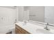 Bright bathroom features a double sink vanity and a shower and tub combo with white walls at 1201 Teakwood Ct, Sanford, NC 27330