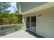 The deck features access to the backyard and sliding door access to the home at 1201 Teakwood Ct, Sanford, NC 27330