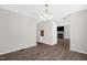 Open living area with hardwood floors flowing into fireplace living room at 1201 Teakwood Ct, Sanford, NC 27330