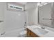 Bathroom with a tub, toilet, and vanity at 125 Davis St, Louisburg, NC 27549